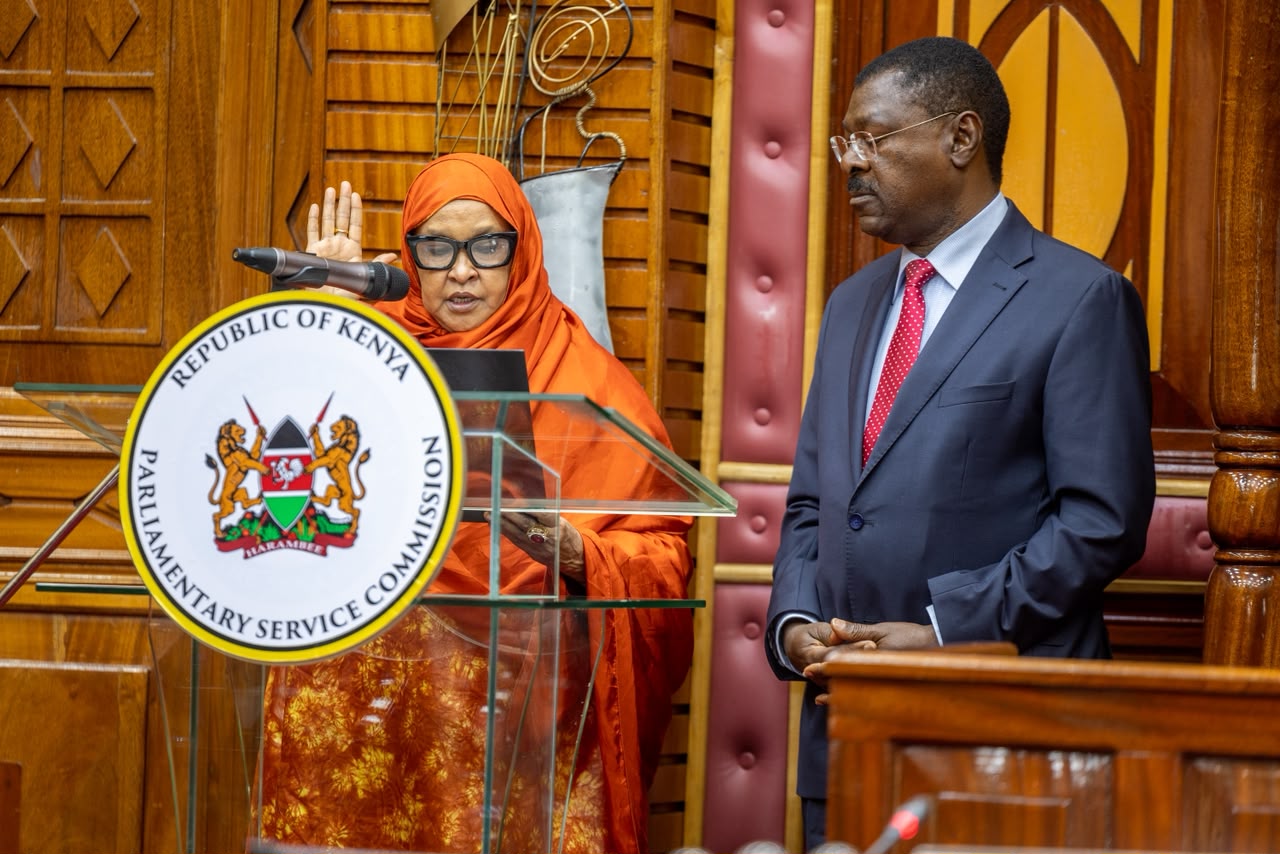 Hon. Fatuma Ibrahim Ali taking the oath of office as the new female non-Member Commissioner.